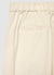 Pantaloni straight a coste con risvolto e vita elasticizzata