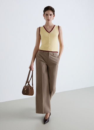 Top with buttons and contrasting trims