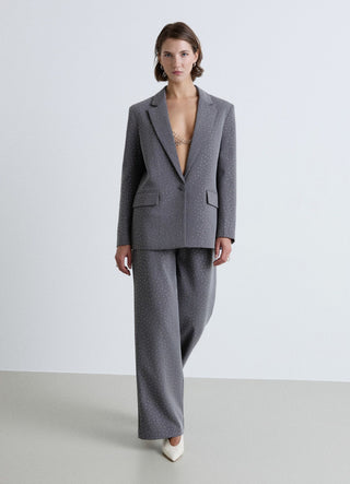 Pantalon palazzo avec strass all over