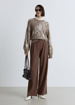 Pantaloni palazzo con patta asimmetrica