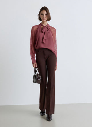 Blusa con fiocco e maniche in pizzo