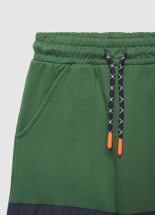 Pantaloni ginnici over con coulisse e tasca zip
