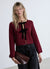 Cardigan crop in maglia con fiocchi