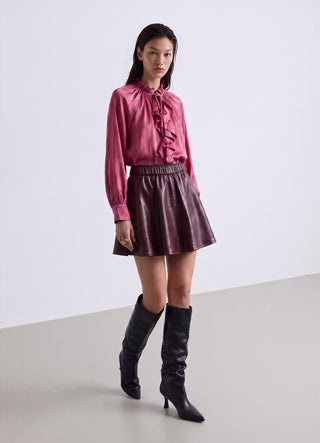 Bluse mit Rüschen und Bändern am Kragen