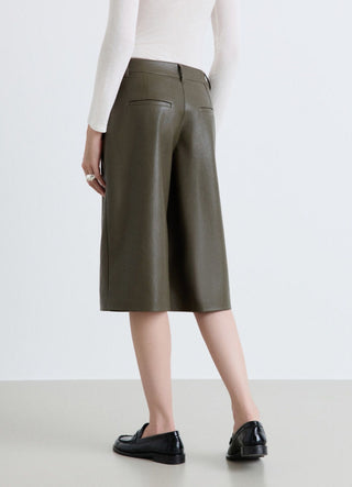 Shorts bermuda a tinta unita con impunture