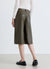 Shorts bermuda a tinta unita con impunture