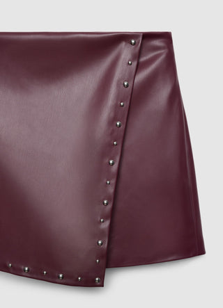 Gonna-pantalone con borchie