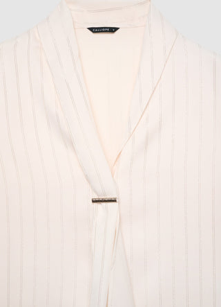 Blusa con rever sciallato a righe