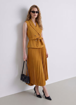 Dress with a fitted bodice vest and pleated skirt