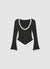 Cardigan with contrast edges and ruffle detailing