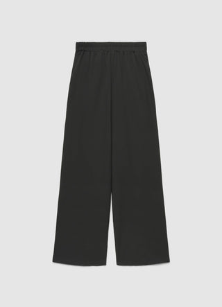 Pantaloni harem con drappeggio e spilla