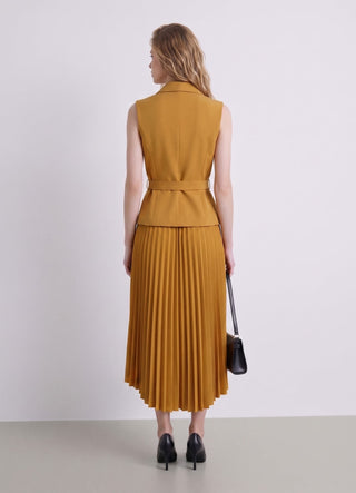 Dress with a fitted bodice vest and pleated skirt