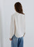 Blusa con rever sciallato a righe