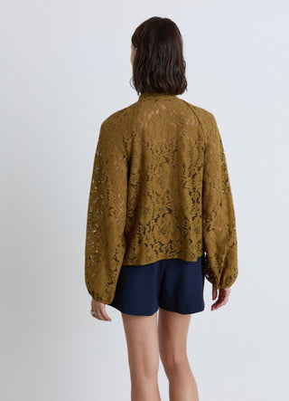 Camicia in pizzo con fiocco al collo