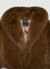 Giacca crop effetto peluche con collo rever