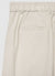 Pantaloni straight a coste con risvolto e vita elasticizzata