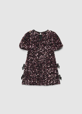 Vestito con paillettes e fiocchi laterali
