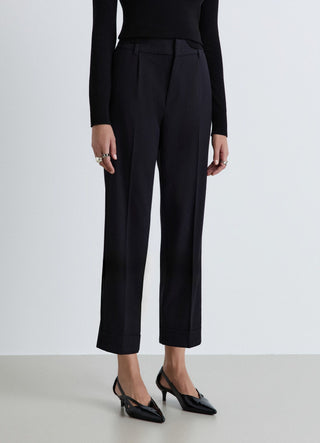 Pantaloni con elastico in vita e risvolto