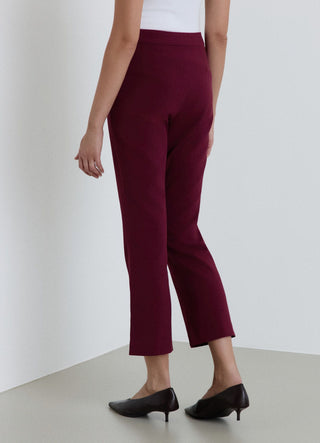 Pantaloni flare a tinta unita
