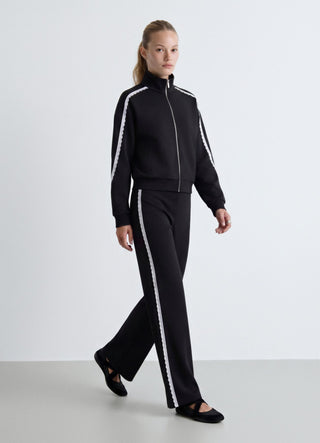 Long flared leggings with lace insert