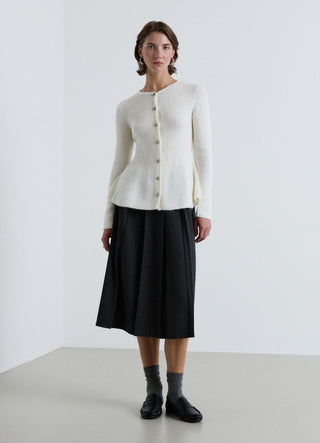 Cardigan peplo con bottoni