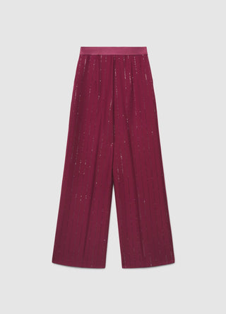 Pantaloni palazzo gessati con paillettes