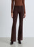Pantaloni flare a tinta unita