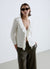 Cardigan pointelle con volant