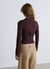 Cropped bustier shirt with V-neckline