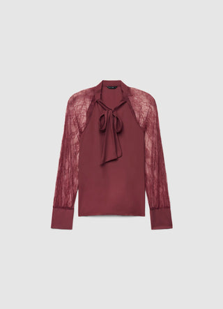 Blusa con fiocco e maniche in pizzo