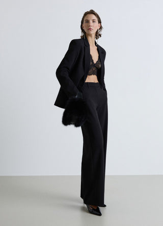 Pantaloni palazzo con strass allover