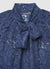 Blusa in pizzo con fiocco al collo
