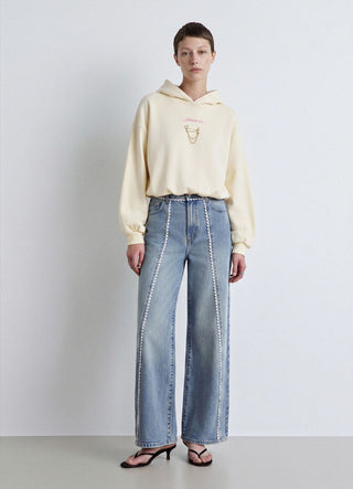 Jeans palazzo con inserti decorativi