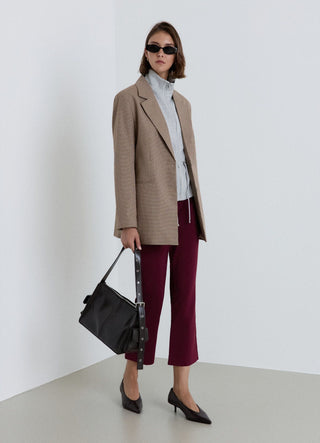 Pantaloni flare a tinta unita