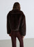 Giacca crop effetto peluche con collo rever