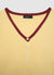 Top with buttons and contrasting trims