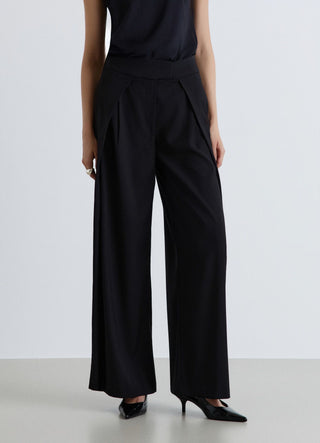 Pantaloni palazzo con pieghe e tasche alla francese