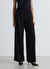 Pantaloni palazzo con pieghe e tasche alla francese