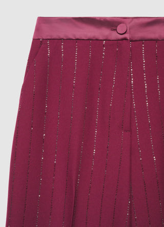 Pantaloni palazzo gessati con paillettes