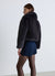 Giacca crop effetto peluche con collo rever