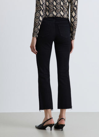 Jeans crop flare con fondo sfrangiato