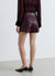 Gonna-pantalone con borchie