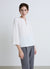 Blouse with keyhole opening and metallic detail