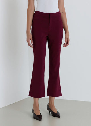 Pantaloni flare a tinta unita
