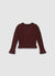Sweater with cable knit and ruffles