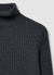 Maglia dolcevita a trecce