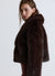 Giacca crop effetto peluche con collo rever