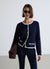 Cardigan con profili a contrasto e bottoni gioiello
