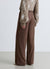 Pantaloni palazzo con patta asimmetrica
