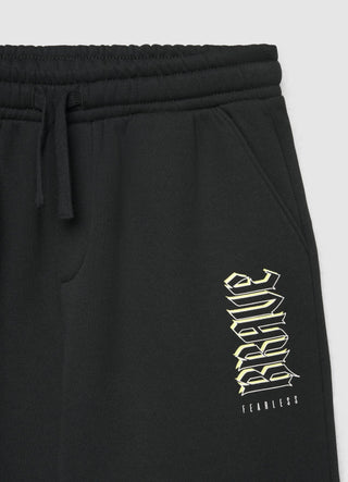Jogger trousers with drawstring and lettering